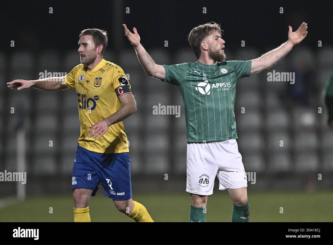 Lommel, Belgium. 07th Nov, 2025. Beveren's goalkeeper Beau Reus and Lommel's Lucas Schoofs fight for the ball during a soccer game between Lommel SK and SK Beveren, Friday 07 November 2025 in Lommel, Belgium. 07th Nov, 2025. Beveren's goalkeeper Beau Reus and Lommel's Lucas Schoofs fight for the ball during a soccer game between Lommel SK and SK Beveren, Friday 07 November 2025 in