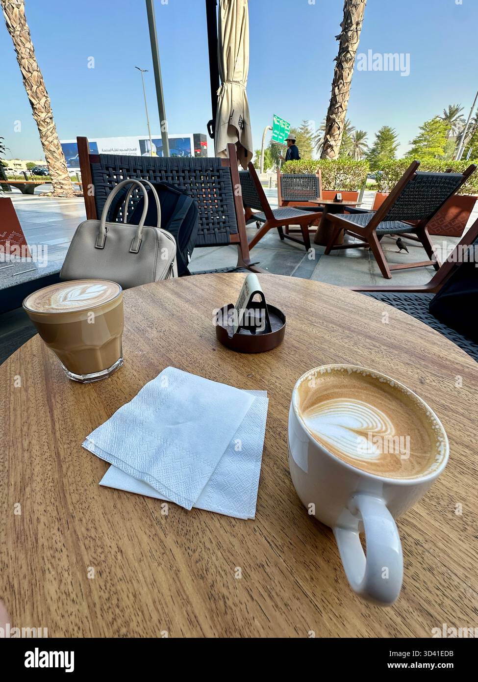 Morning coffee outside cafe Dubai - Smartphone Captured Stock Image
