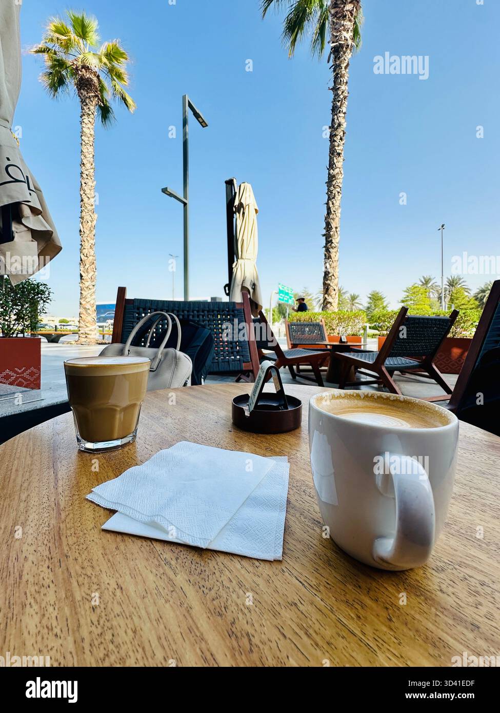 Morning coffee outside cafe Dubai - Smartphone Captured Stock Image