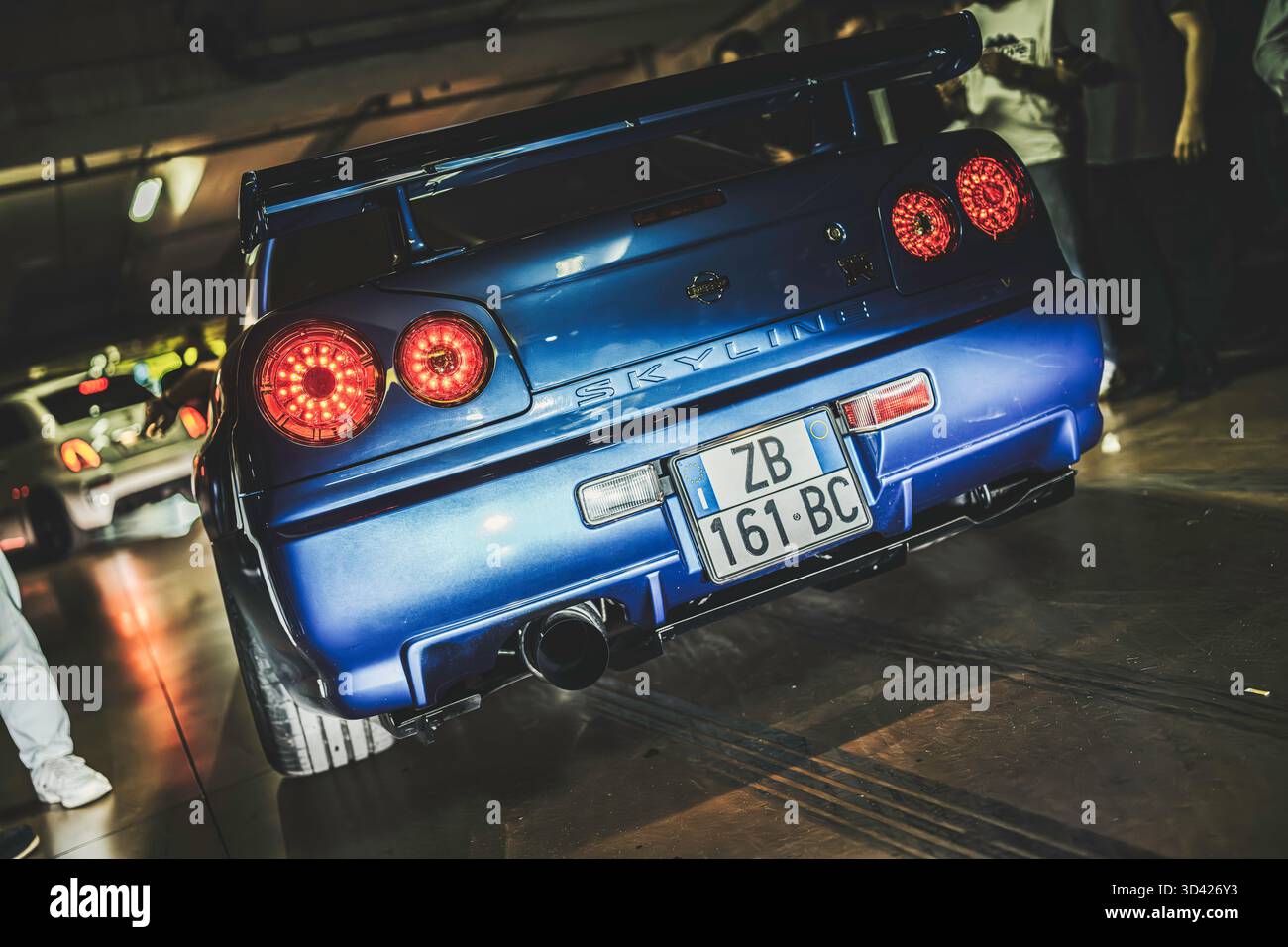 Milan, italy 28 october 2025: blue nissan skyline gt-r r34 rear view ...