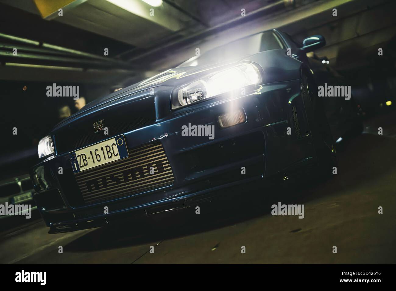 Milan, italy 28 october 2025: nissan skyline gt-r r34 sports car parked ...