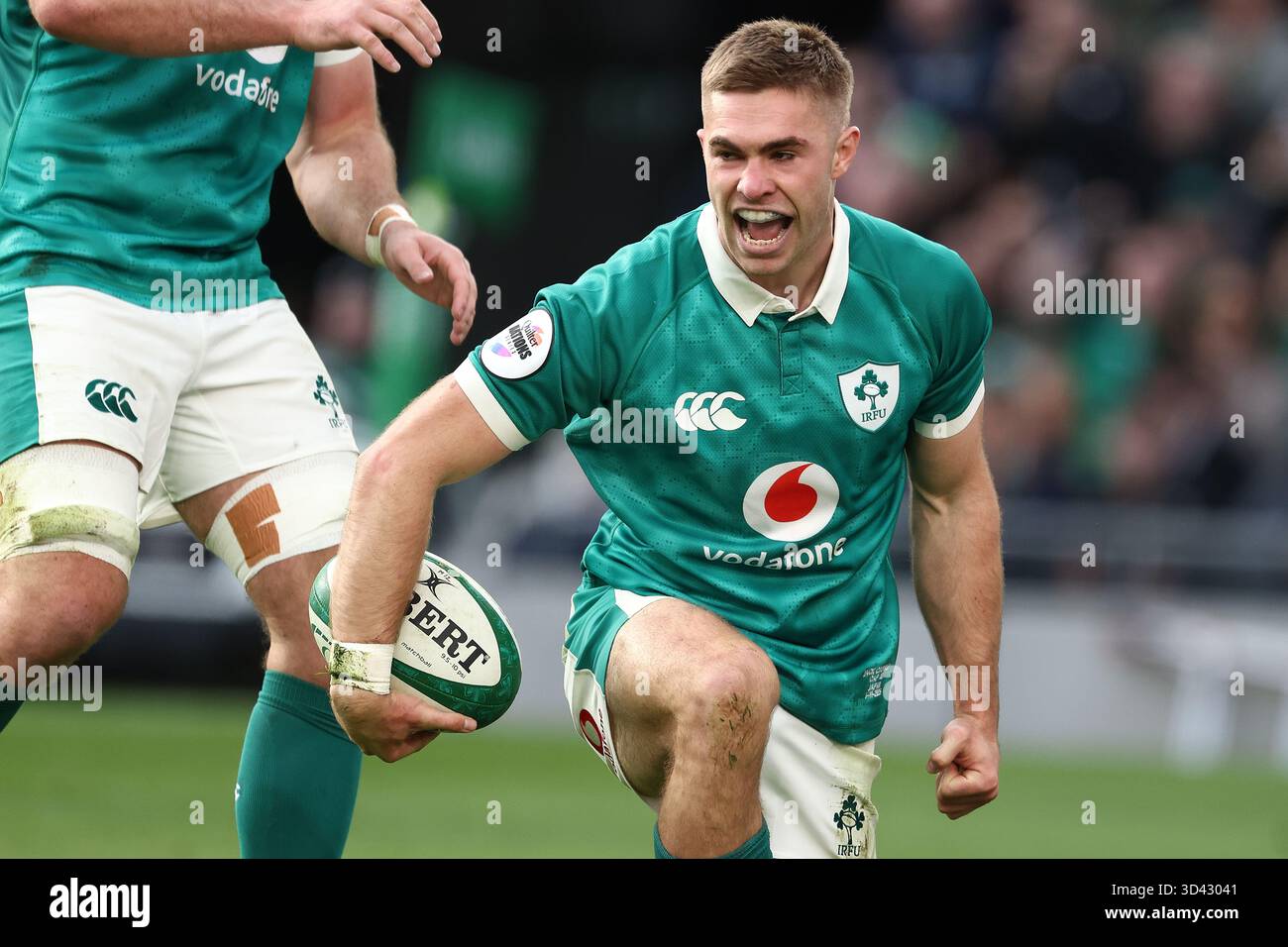 Ireland's Jack Crowley reacts after scoring a try during the rugby ...