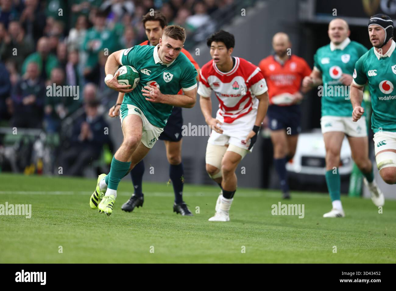 Ireland's Jack Crowley runs the ball during the rugby union Nations ...