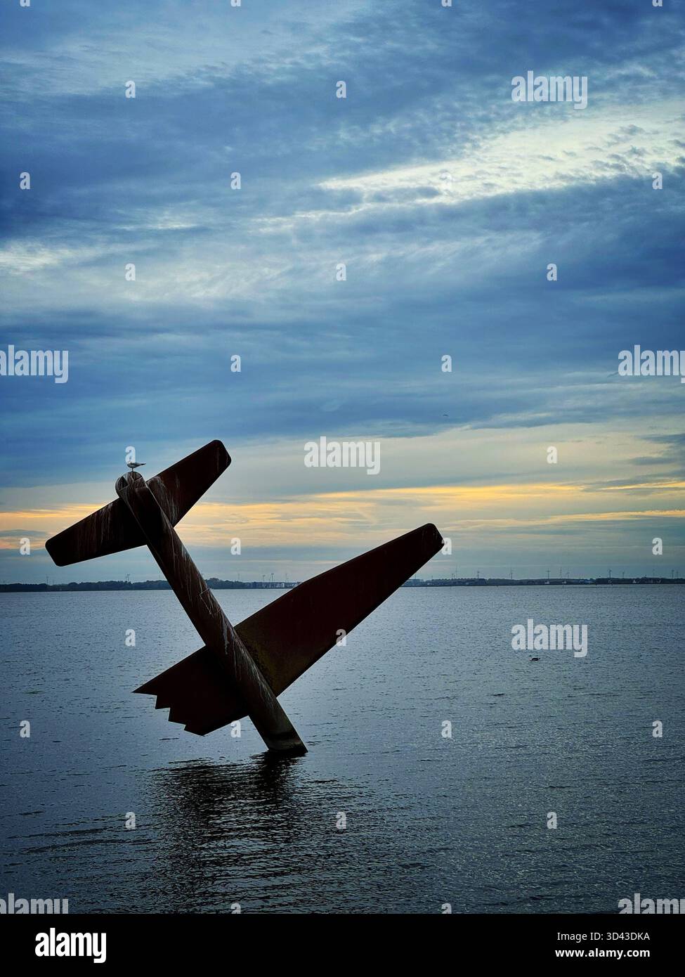 Sculpture by Arend Kleinpaste - Memorial to Allied Fliers in Harderwijk, Netherlands, dusk. - Smartphone Captured Stock Image
