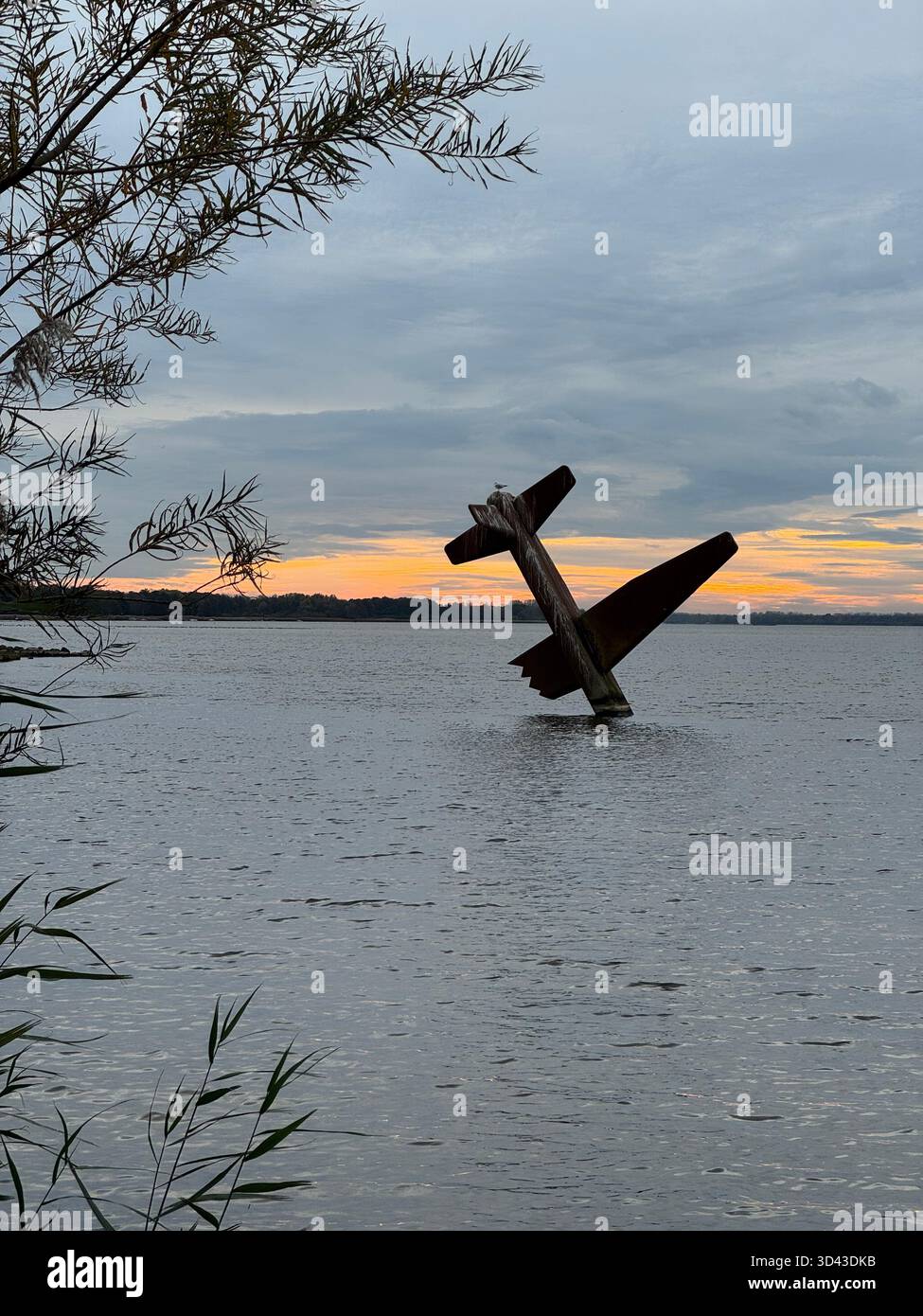 Sculpture by Arend Kleinpaste - Memorial to Allied Fliers in Harderwijk, Netherlands, dusk. - Smartphone Captured Stock Image