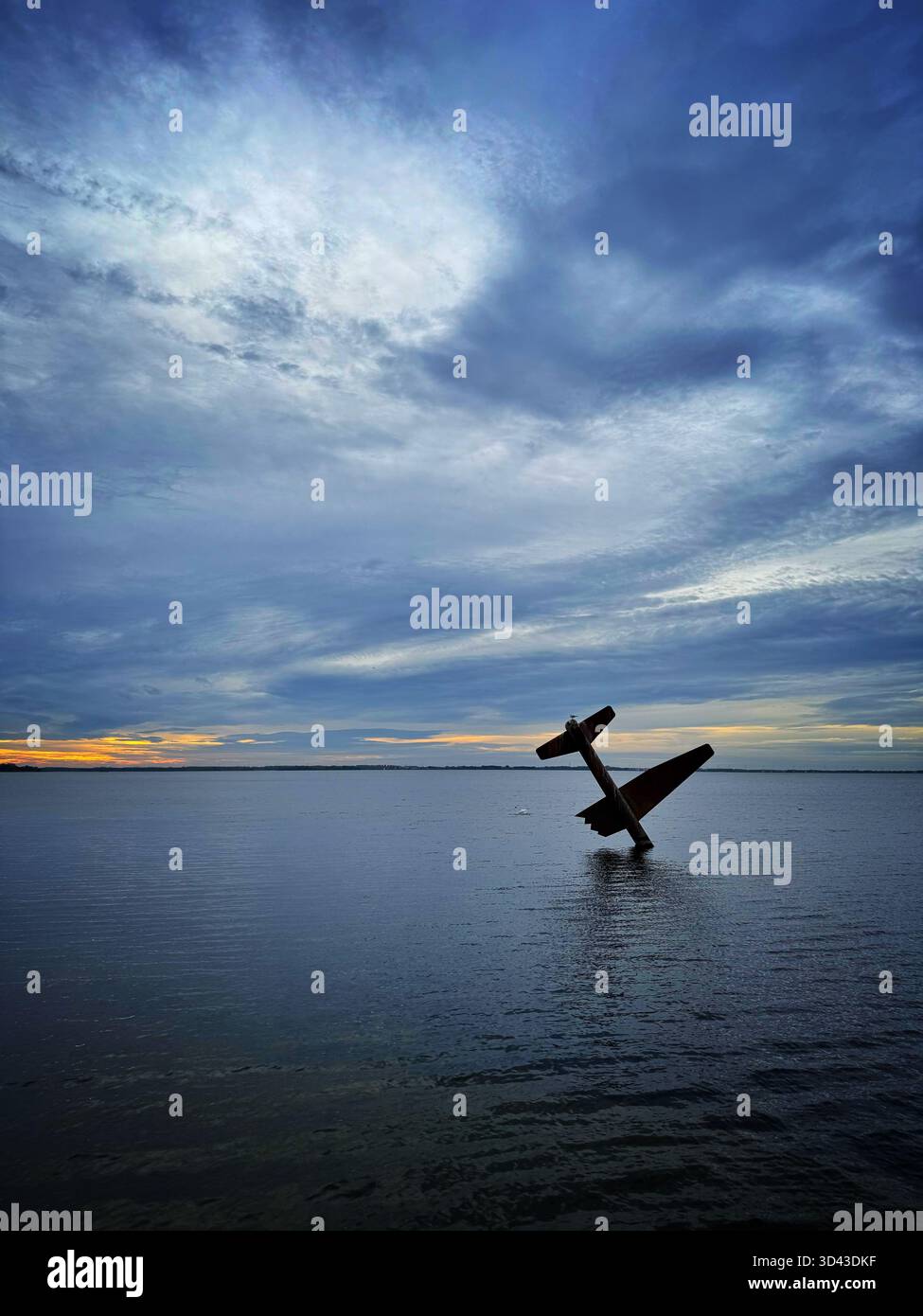 Sculpture by Arend Kleinpaste - Memorial to Allied Fliers in Harderwijk, Netherlands, dusk. - Smartphone Captured Stock Image