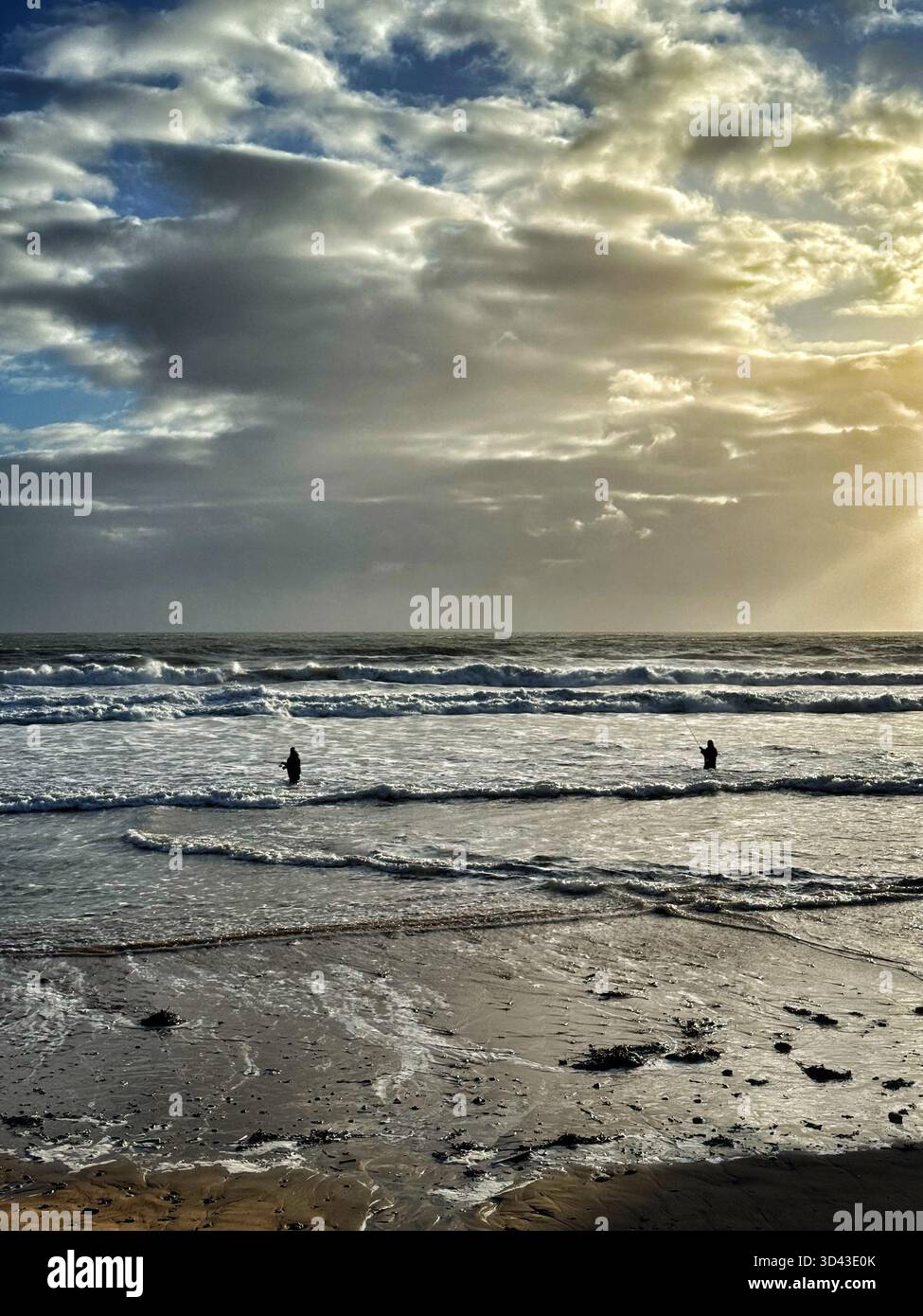 Bass anglers at Caswell Bay, Swansea, Gower, Wales. - Smartphone Captured Stock Image