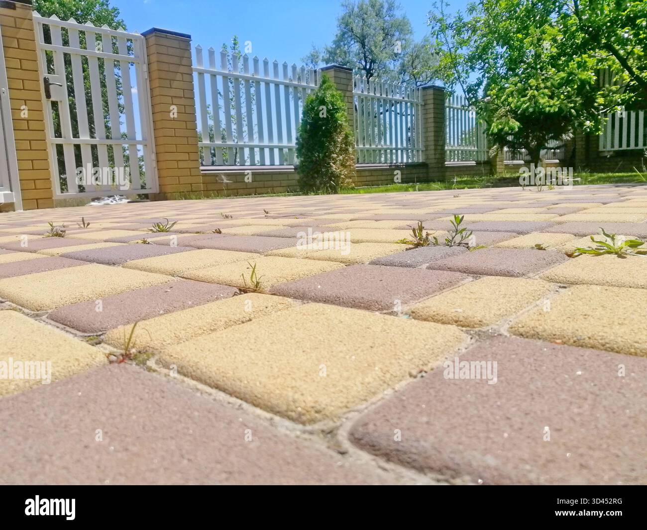 Minimalist fencing in front of modern house exterior illustrating ...