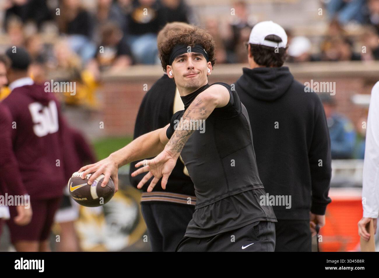 Missouri quarterback Matt Zollers warms up before an NCAA college