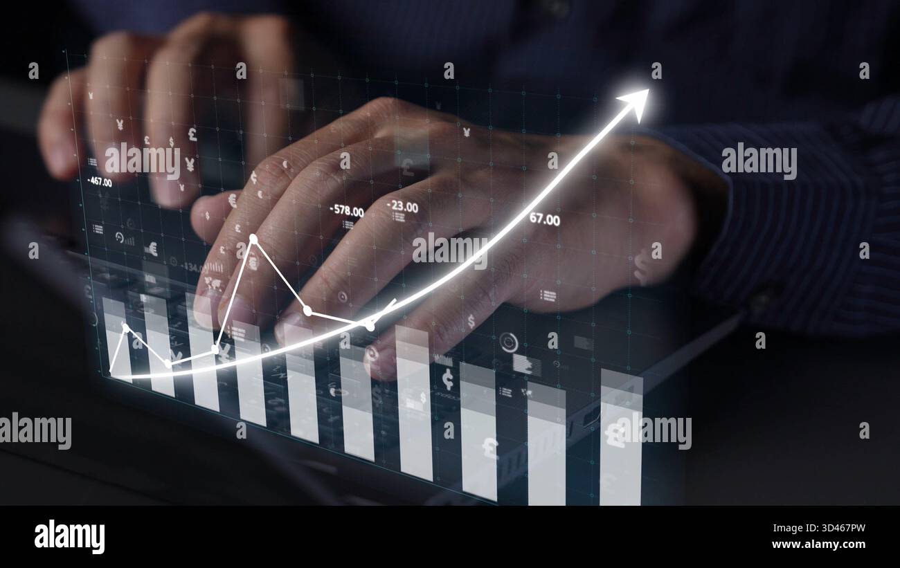 A businessperson engages with a digital tablet showcasing financial ...