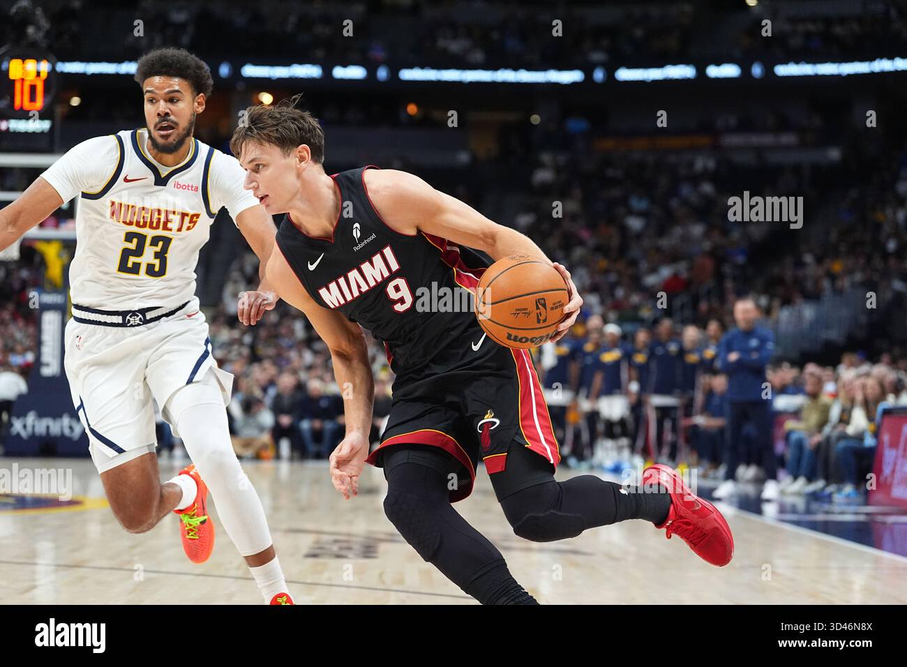Miami Heat Guard Pelle Larsson 9 Dirves Past Denver Nuggets Forward Miami Heat Guard Pelle Larsson 9 Dirves Past Denver Nuggets Forward