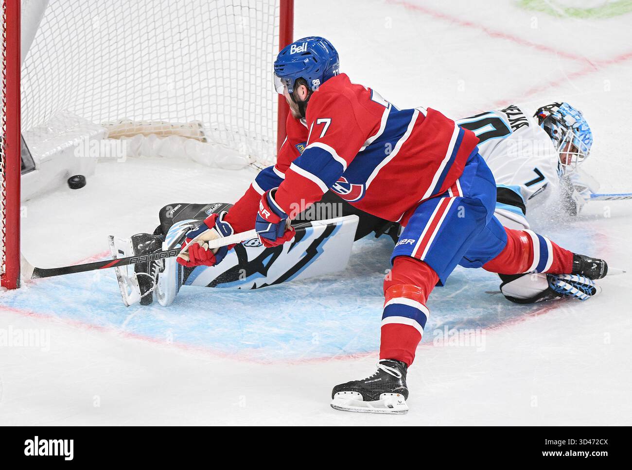 Montreal Canadiens' Kirby Dach (77) scores against Utah Mammoth ...