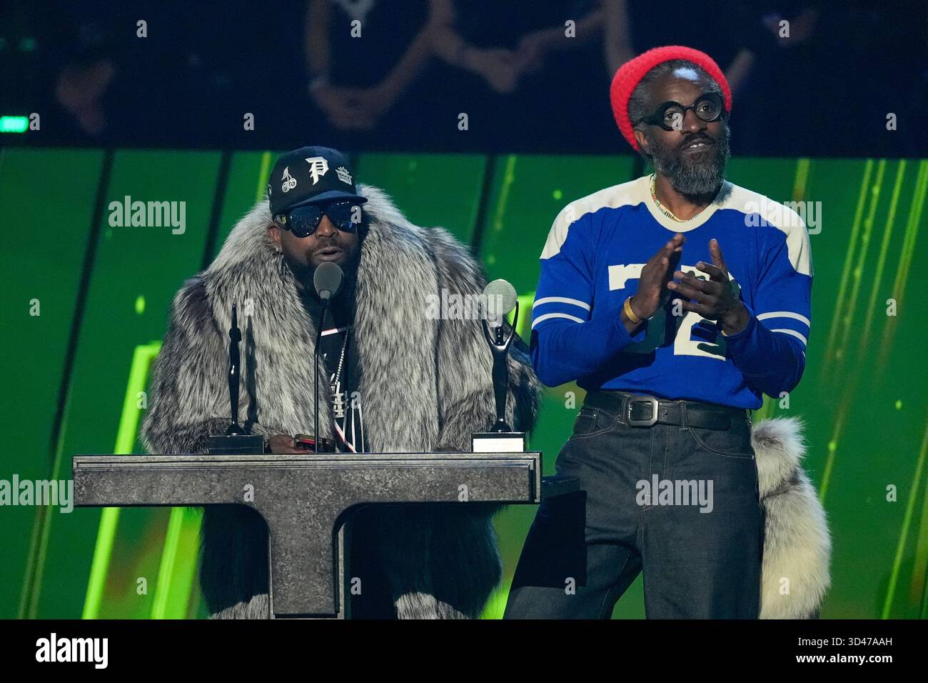 Inductees Big Boi, left and André 3000 of OutKast during the 2025 Rock ...