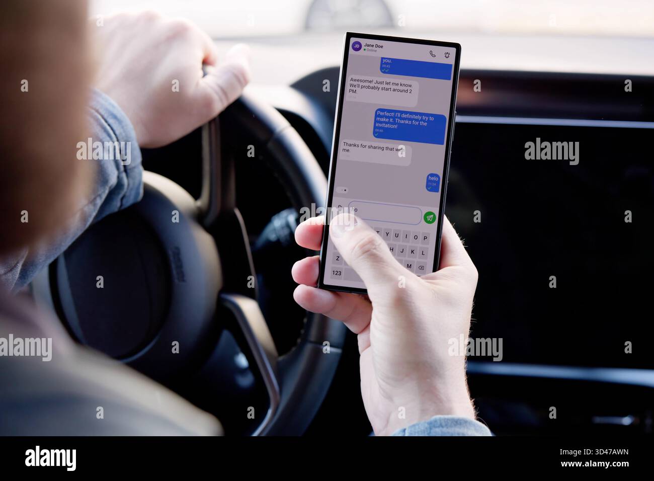 Multitasking Mechanic Checking Phone During Car Repairs, Fixing, Auto, Mechanic Stock Photo