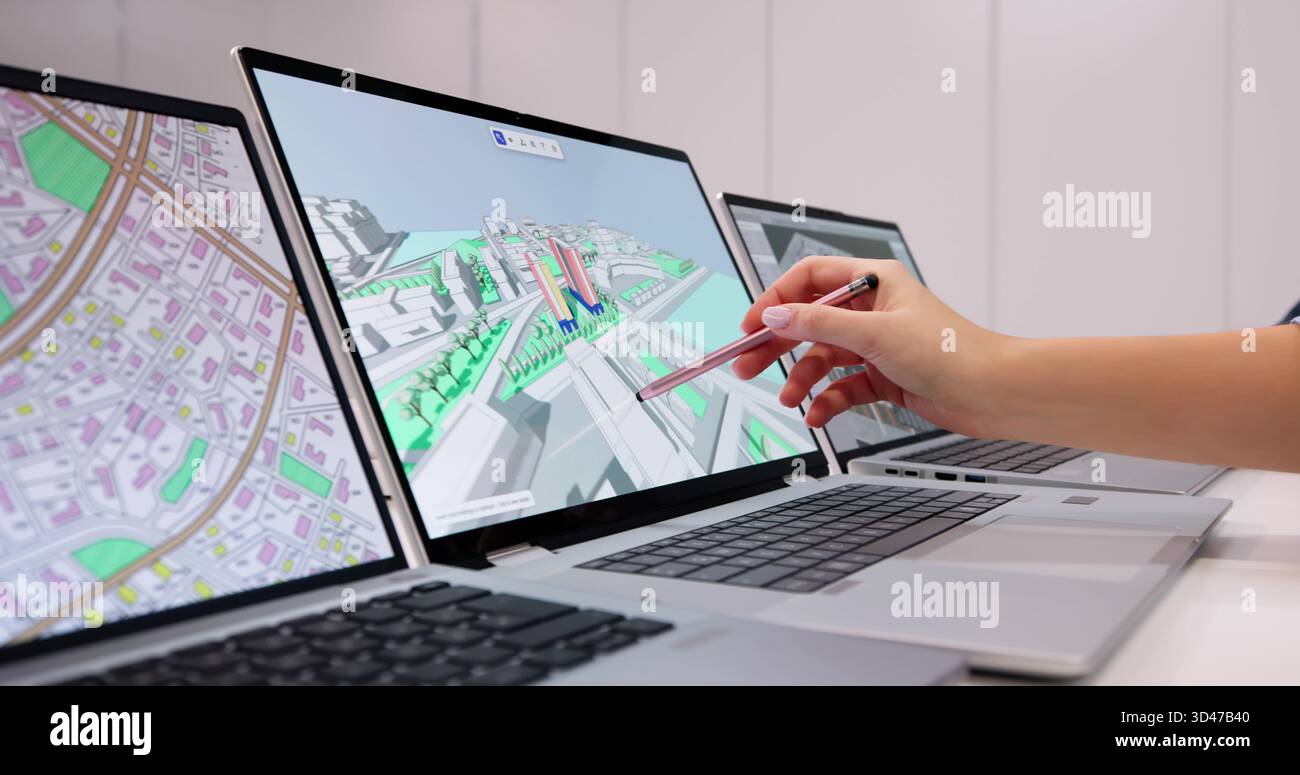 Engineer Uses GIS Software To Inspect Construction Project On PC Stock ...