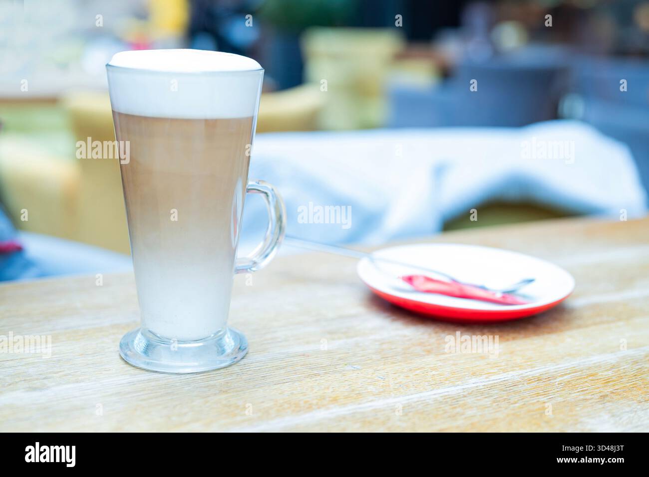 aromatic latte coffee in a glass at a restaurant Stock Photo
