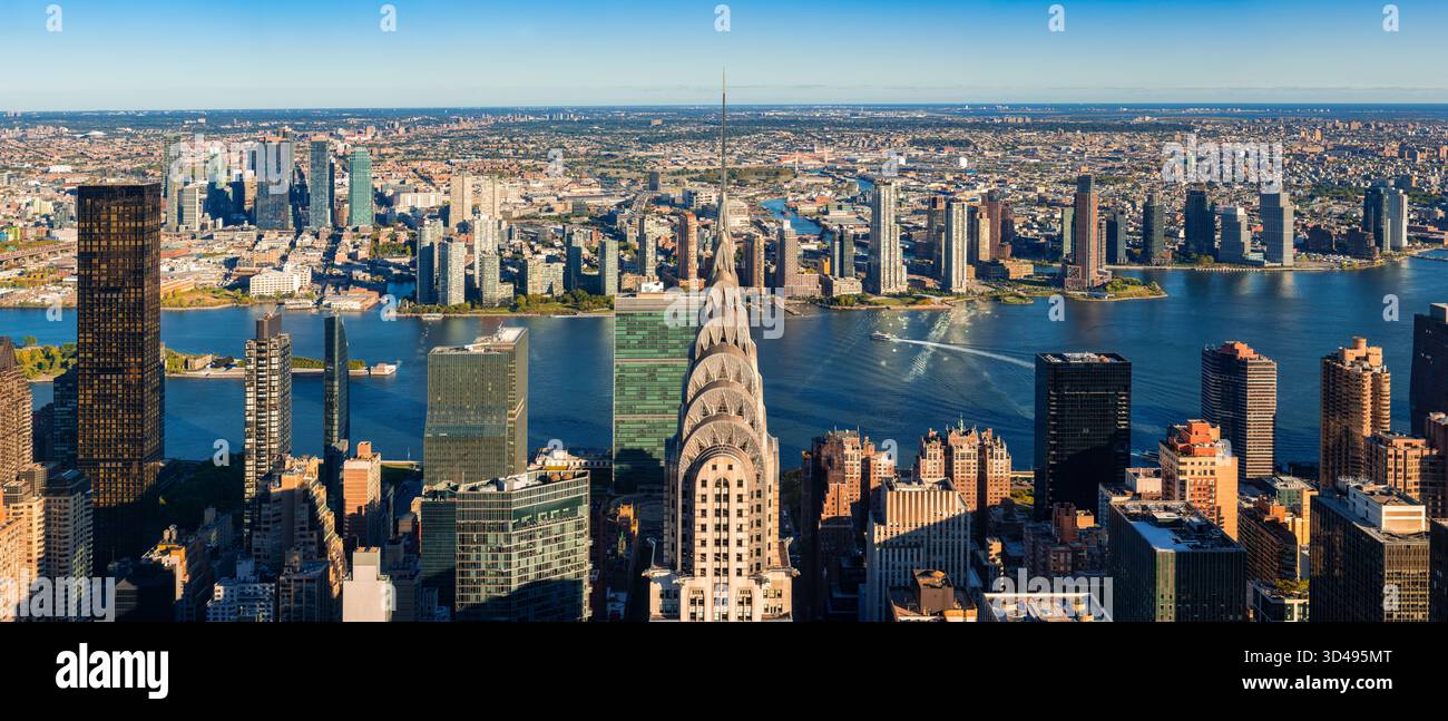 Aerial panoramic view of Midtown Manhattan skyscrapers and East River ...
