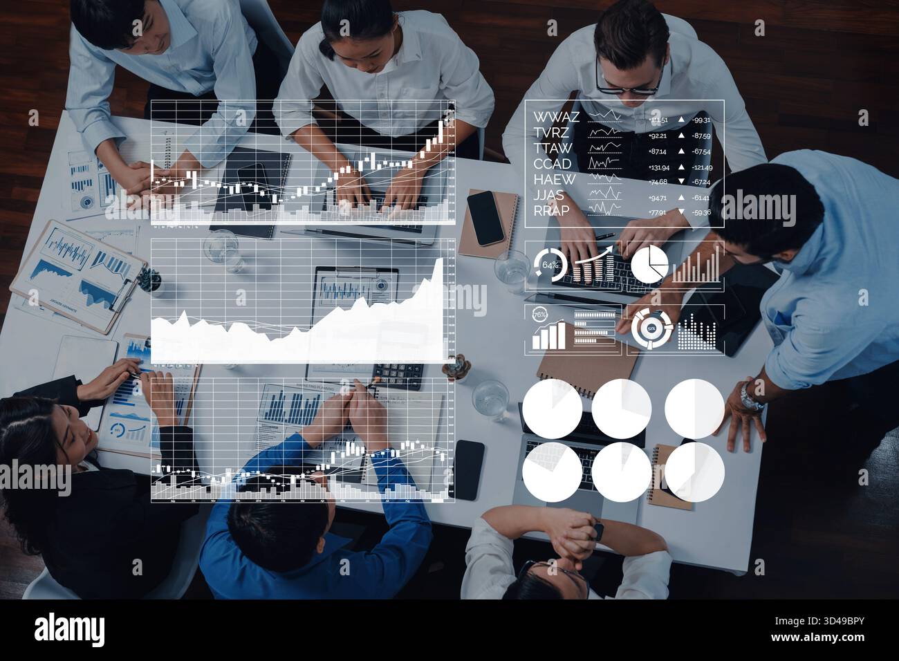 A business team engaging in collaboration around a table, analyzing ...
