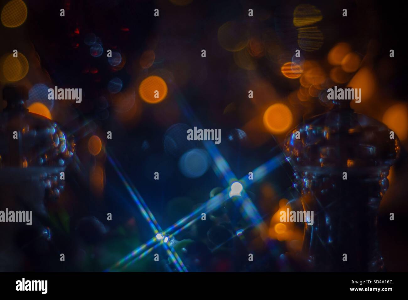 Reflections in Orbit: Bokeh and Starburst Elegance Stock Photo