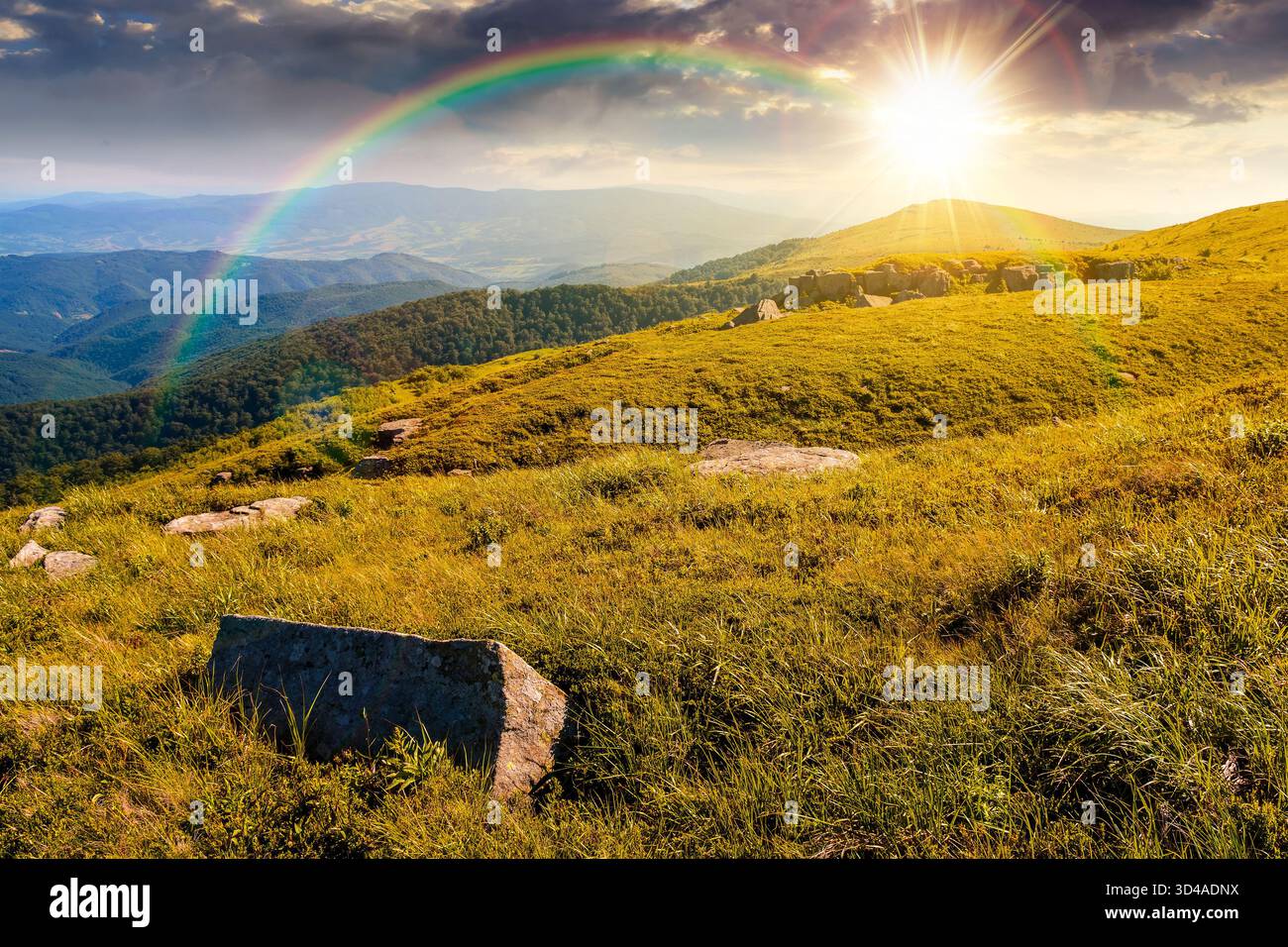 green alpine meadows in mountains in summer at sunset. stones on grassy hills in evening light. popular travel destination for photo. storytelling ima Stock Photo