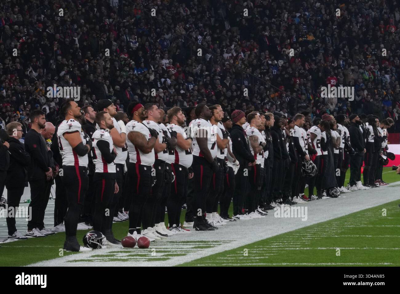 Atlanta Falcons Players And Coaches Stand For The National Anthem Atlanta Falcons Players And Coaches Stand For The National Anthem Before An Nfl Football Game Against The Colts In Berlin Germany Sunday Nov 9 2025 Dave Shoplandap Content Services For The Nfl 3D4AN85 