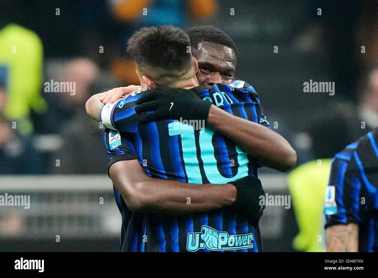 Inter Milan's Ange-Yoan Bonny, rear, celebrates after scoring his side ...