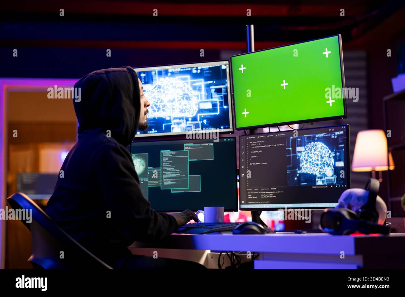 Hacker coding on green screen PC using machine learning to evade security with stealth malware. Evil man using neural network script on mockup computer to hide malicious code from detection systems Stock Photo