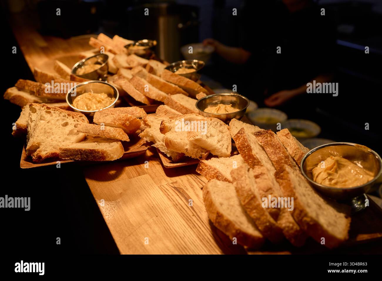 A beautifully arranged Assorted Bread Platter featuring a variety of ...