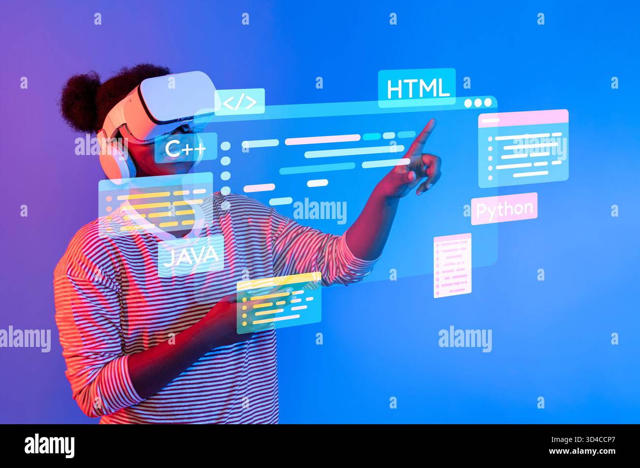 A young person explores programming concepts through virtual reality, showcasing various coding languages on a vibrant digital interface in a modern Stock Photo
