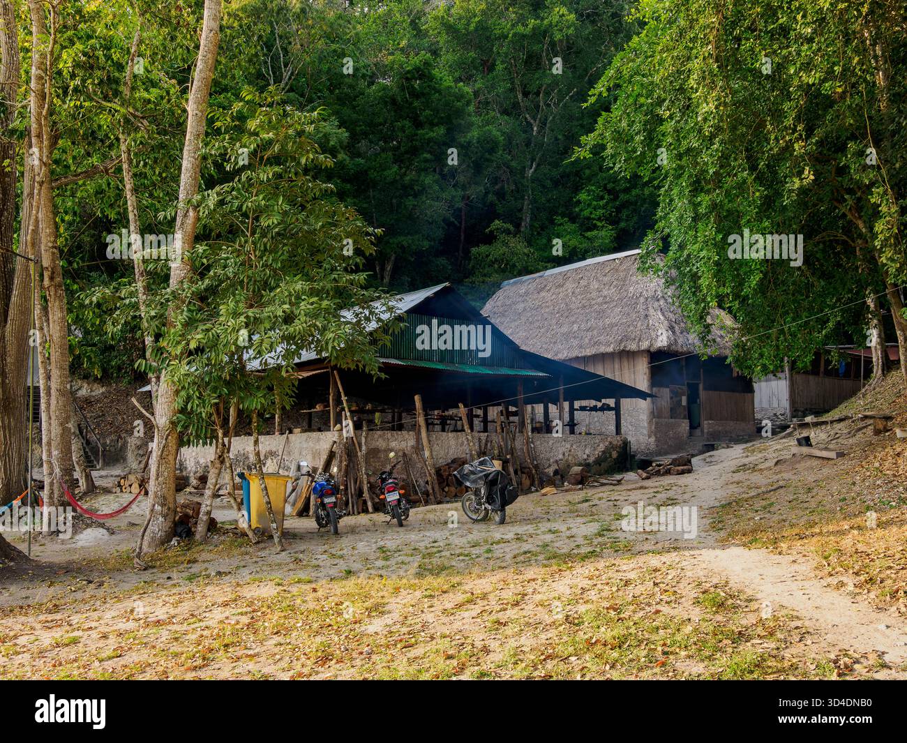 Houses at the lakefront of Yaxha Lake at Yaxha Archaeological Site, Peten Department, Guatemala Stock Photo