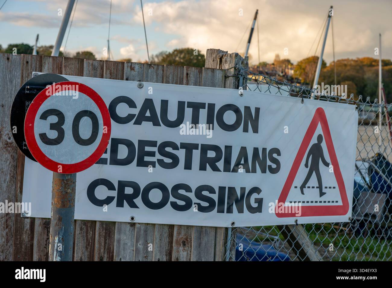 30mph warning sign with pictorial pedestrian walking on red border ...