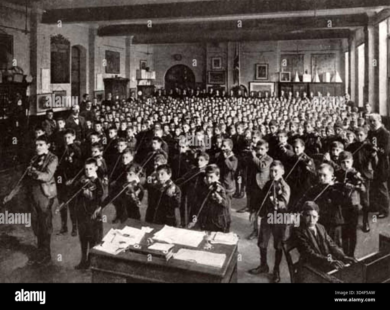 SCHOOL MORNING ASSEMBLY about 1890 at Kilburn Lane High Grade Board School in Kilburn north London Stock Photo