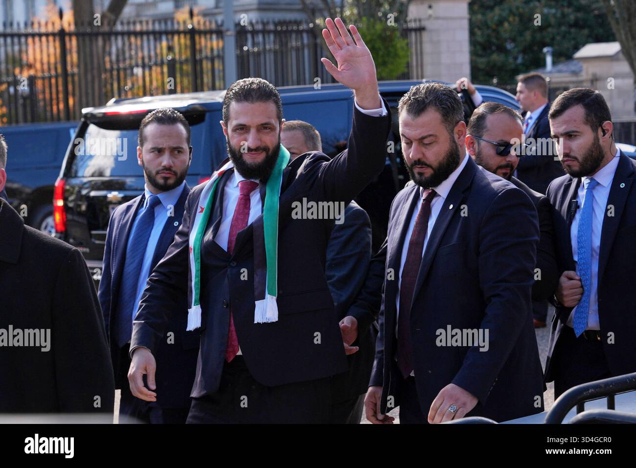 Syria's President Ahmed al-Sharaa waves as he greets supporters outside of the White House, Monday, Nov. 10, 2025, in Washington, following a meeting with President Donald Trump. (AP Photo/Jacquelyn Martin) Stock Photo