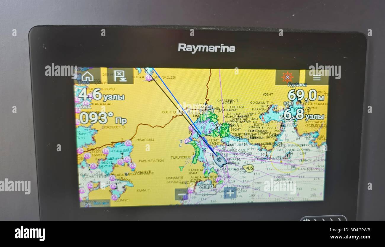 . Navigation display features a detailed marine chart, indicating route, depth, and location, essential for safe boating and navigation - Smartphone Captured Stock Image
