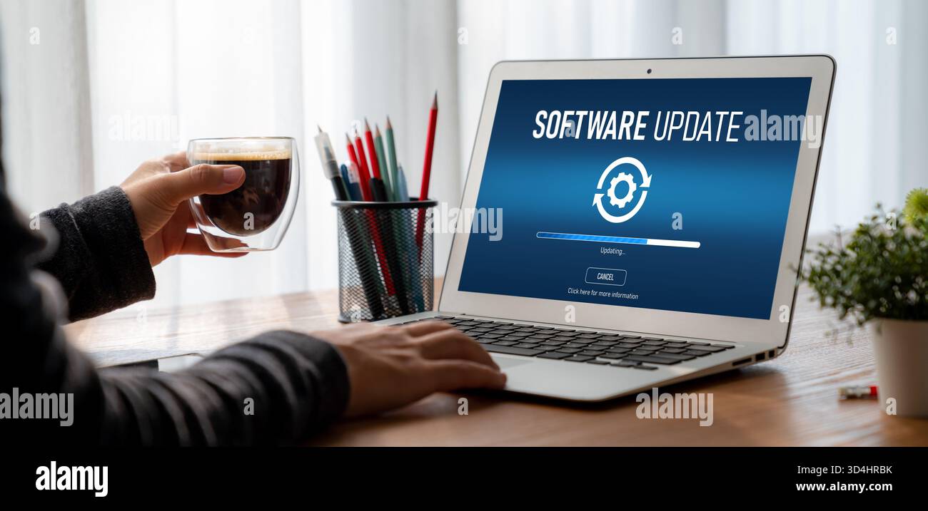 Software update on computer for modish version of device software upgrade Stock Photo