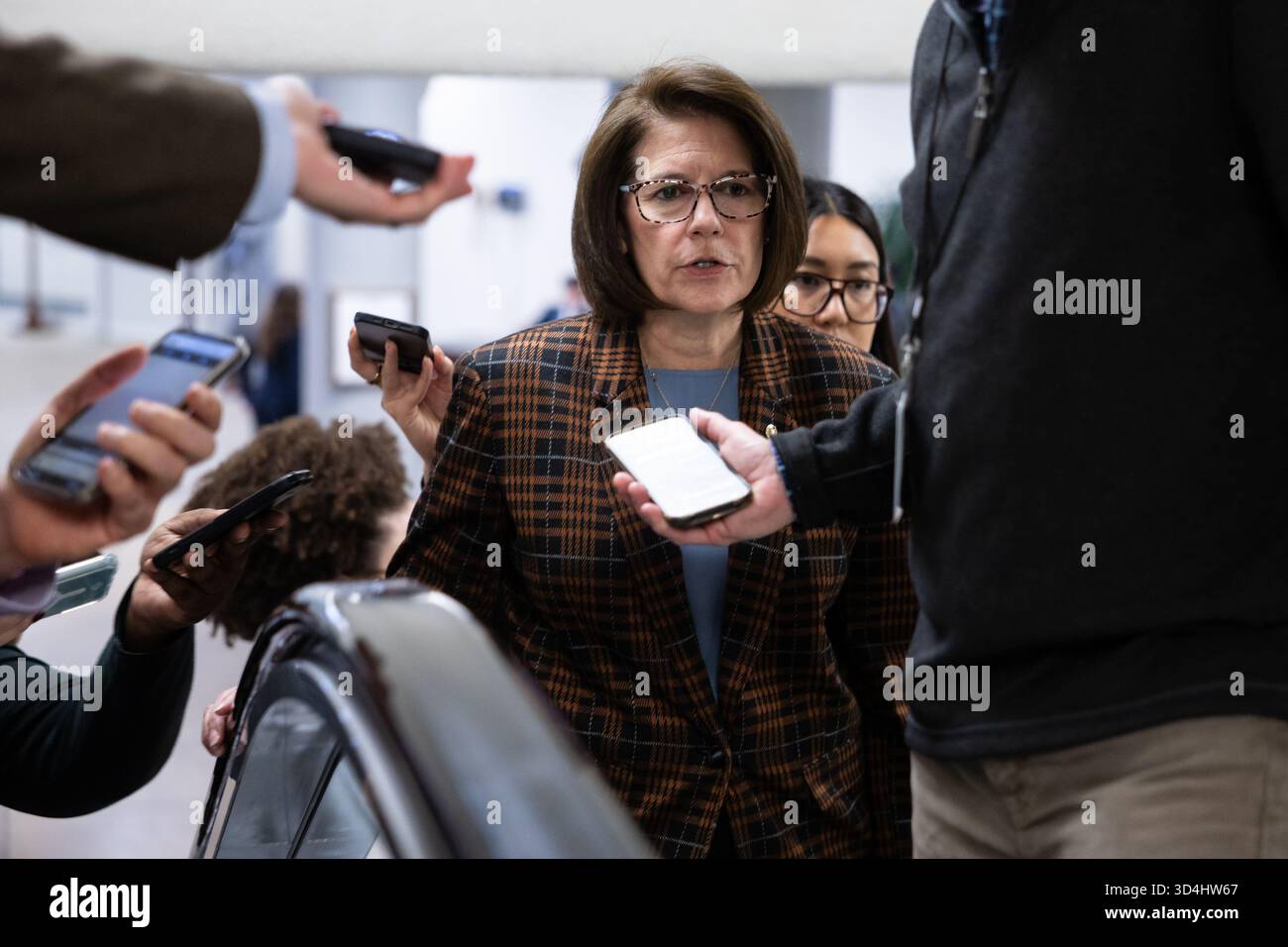 Sen. Catherine Cortez Masto (D-Nev.) speaks with reporters on the way ...