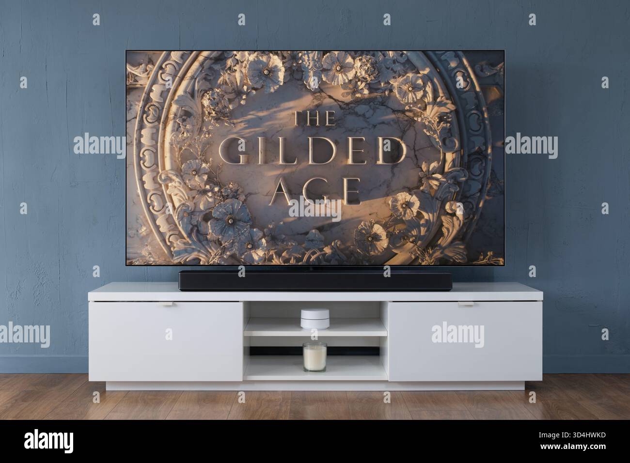 A widescreen OLED television showing the intro scene to the TV series The Gilded Age, seen in a contemporary living room. Stock Photo