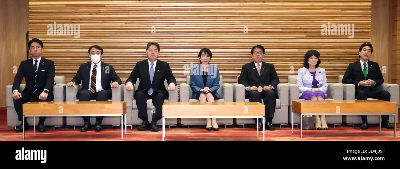 Japanese Prime Minister Sanae Takaichi (C) attends a cabinet meeting at ...