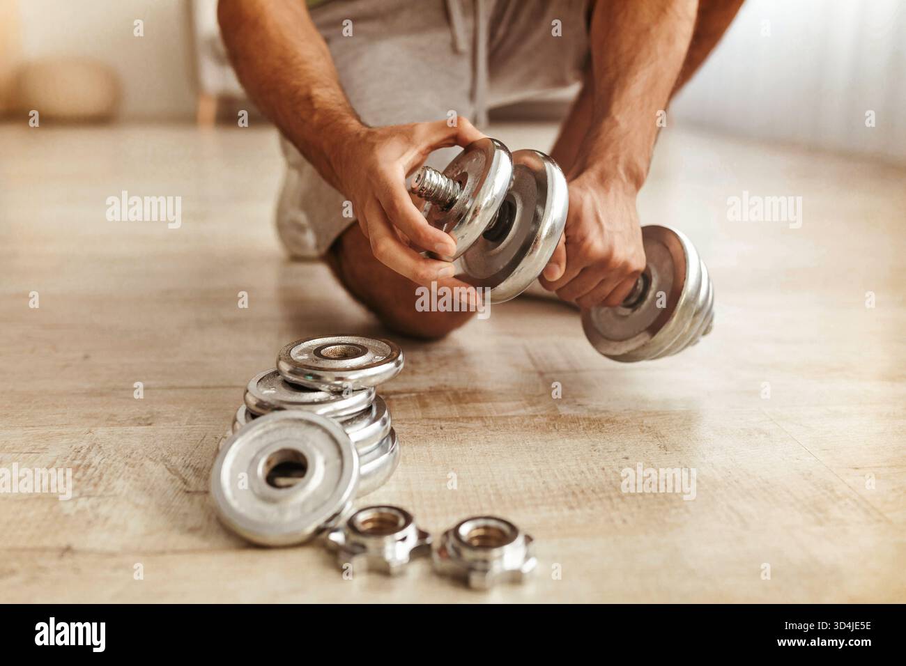 Lifting Weights in a Home Gym During a Fitness Session for Strength ...