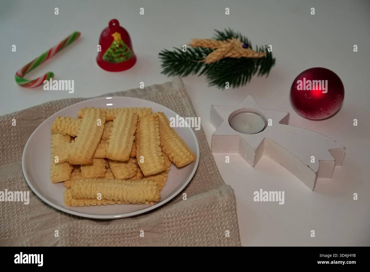 Biscuits on the plate with Christmas ornaments Stock Photo