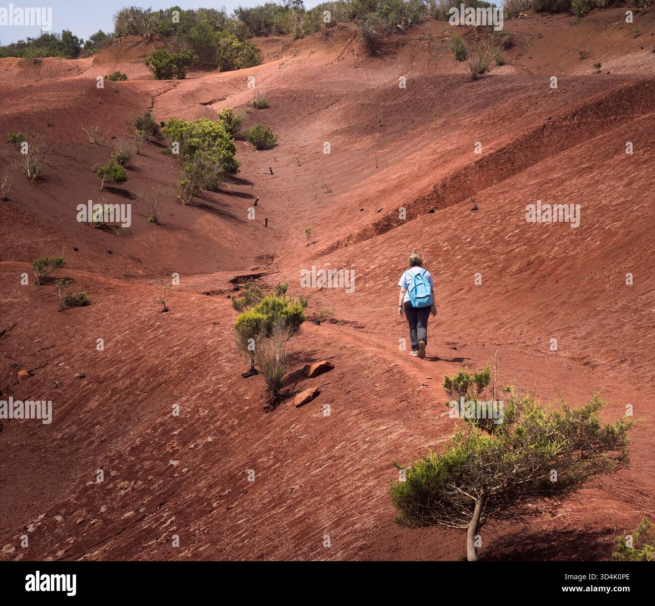 Mature woman walks along hiking hi-res stock photography and images - Alamy