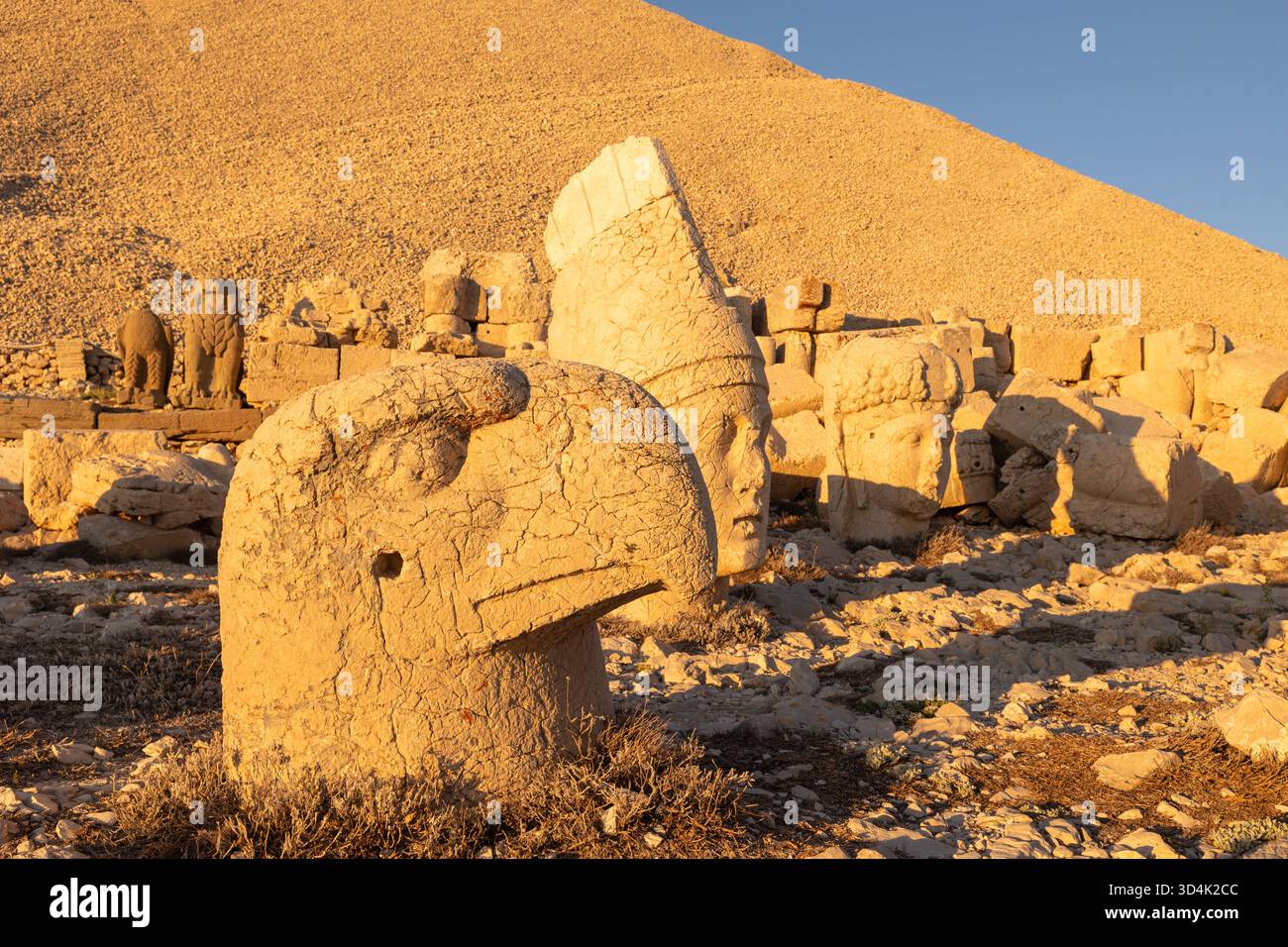 Persian eagle and apollo statues of Mount Nemrut at sunset. Stock Photo