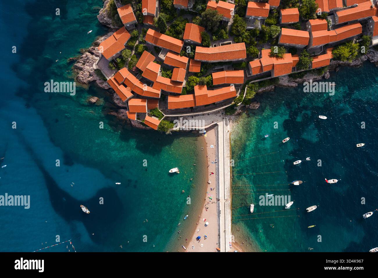 Sandy Islets Aerial view of red-roofed buildings clustered tightly on a small islet ...