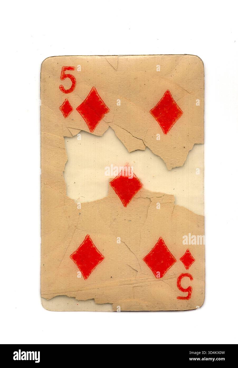 A badly damaged vintage playing card in the suit of diamonds isolated ...