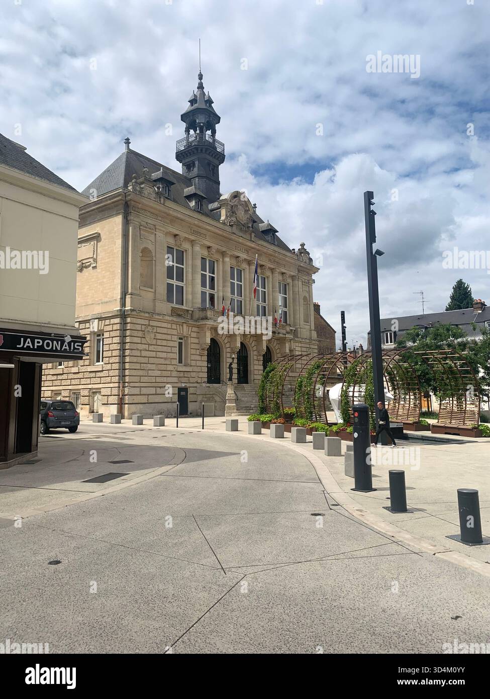 Vernon France water bridge bike bikes place old famous street town people lake signs holiday tour tourist tourists weather shop shops local place - Smartphone Captured Stock Image