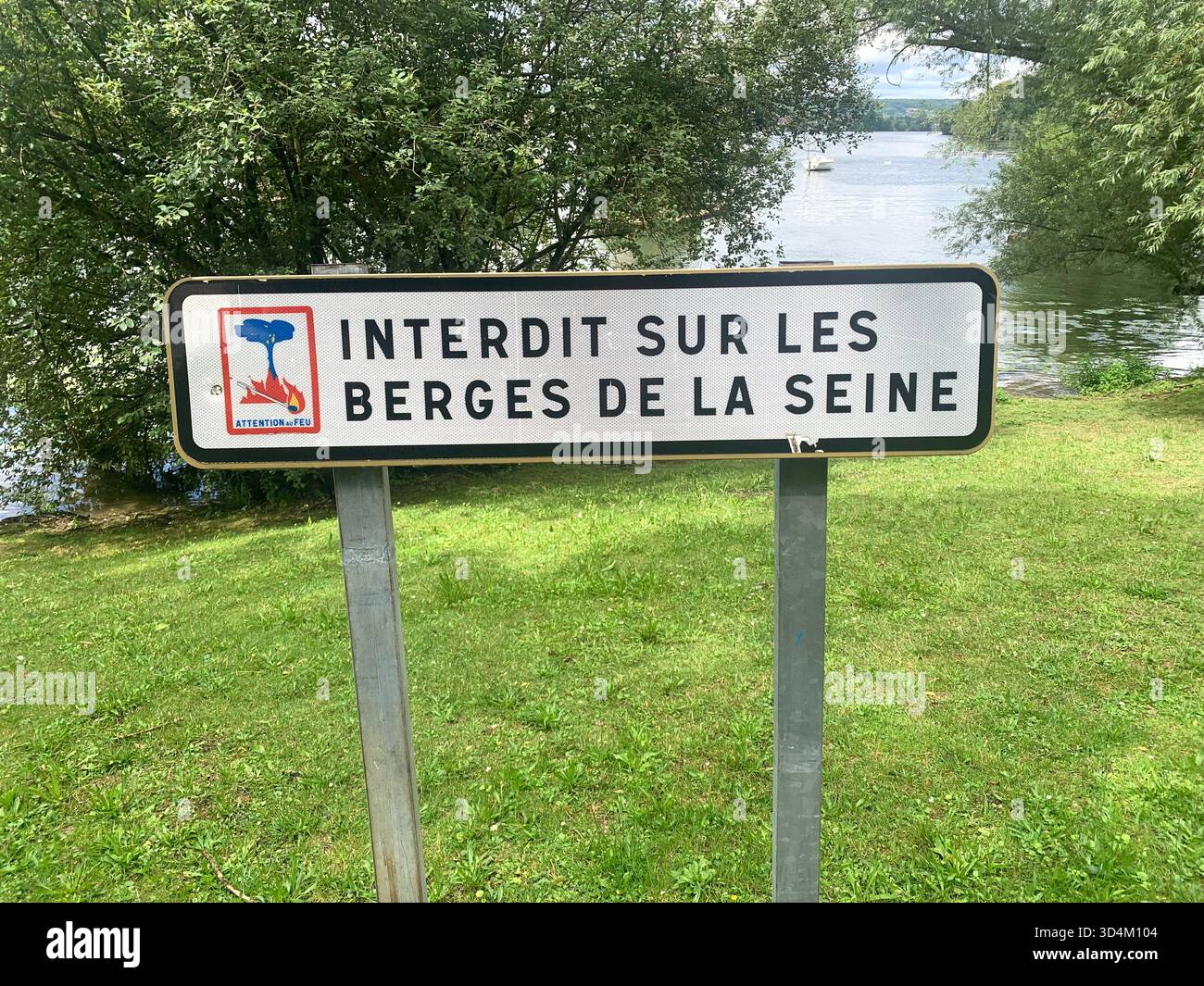 Vernon France water bridge bike bikes place old famous street town people lake signs holiday tour tourist tourists weather shop shops local place - Smartphone Captured Stock Image