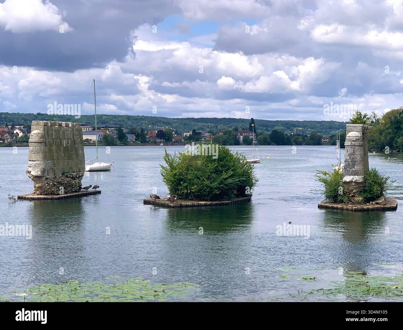 Vernon France water bridge bike bikes place old famous street town people lake signs holiday tour tourist tourists weather shop shops local place - Smartphone Captured Stock Image