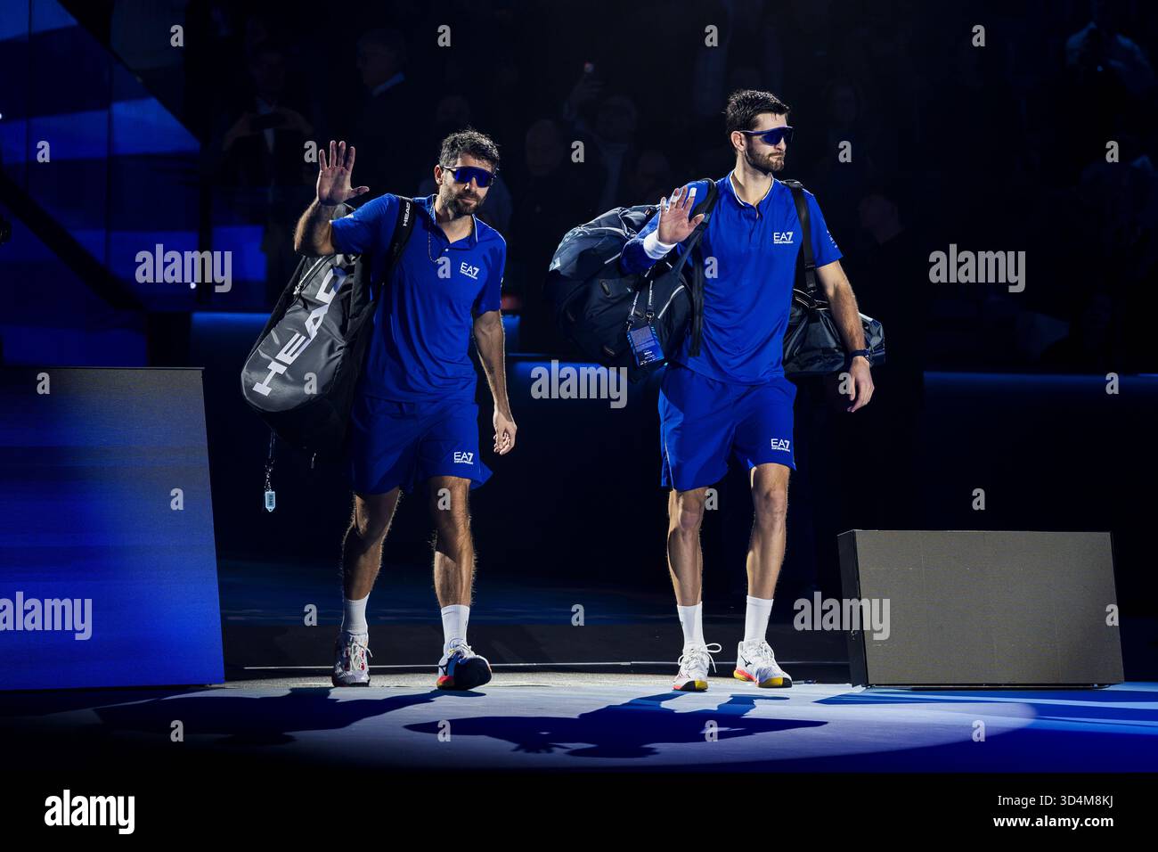 Simone Bolelli (L) and Andrea Vavassori of Italy walk out prior to their round robin doubles match against Marcel Granollers of Spain and Horacio Zeballos of Argentina during day three of the Nitto ATP Finals 2025. Simone Bolelli and Andrea Vavassori won 7-6(4), 6-4. Stock Photo
