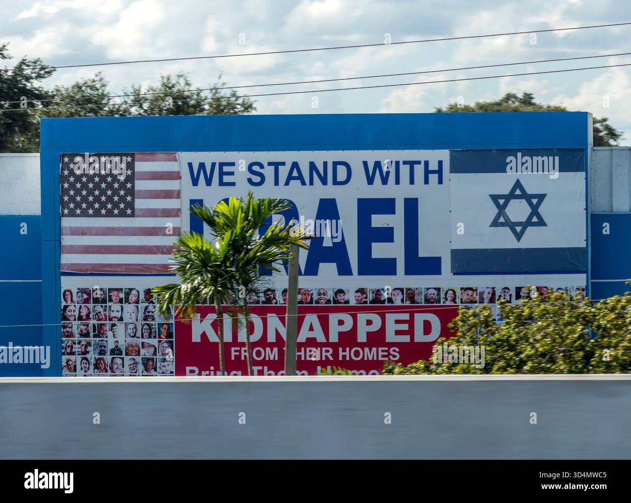 Billboard expressing solidarity with Israel and highlighting kidnapped individuals in a public display following October 7, 2024 Stock Photo