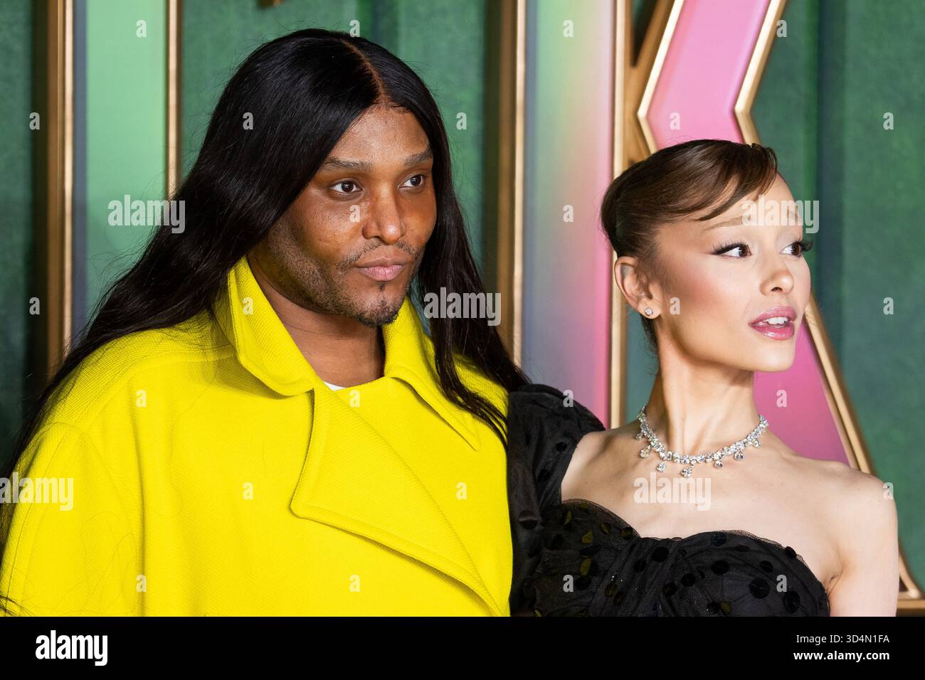 Law Roach, left, and Ariana Grande pose for photographers upon arrival